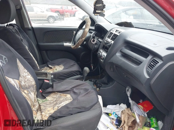 2006 Kia Sportage LX z VIN KNDJF723367282007, wystawiony jako IAAI lot #41214330 z przebiegiem 168 793 mil mil oraz . Historia ofert i sprzedaży dostępna na DreamBid. Obrazek 5.