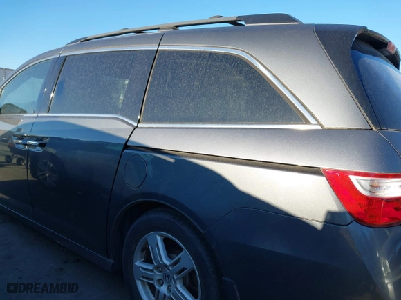 2013 Honda Odyssey Touring with VIN 5FNRL5H9XDB009973, listed as a IAAI auction lot 41904710 with 219,067 mi miles. Bid and sale history available at carsss.com. Image 14.