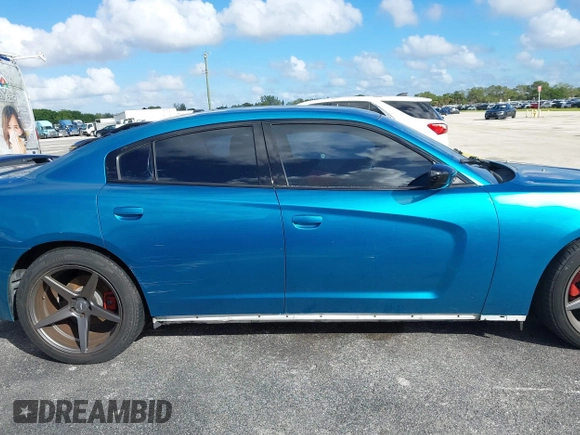2012 Dodge Charger SXT with VIN 2C3CDXHG0CH185859, listed as a IAAI auction lot 40816799 with 132,572 mi miles. Bid and sale history available at carsss.com. Image 13.