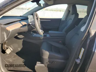 2024 Tesla Model Y Long Range с VIN 7SAYGDEE3RA236473, выставлен на аукционе Copart как лот 77409334 с пробегом 5 822 миль миль и Списание • Salvage title. История ставок и продаж доступна на DreamBid. Изображение 7.