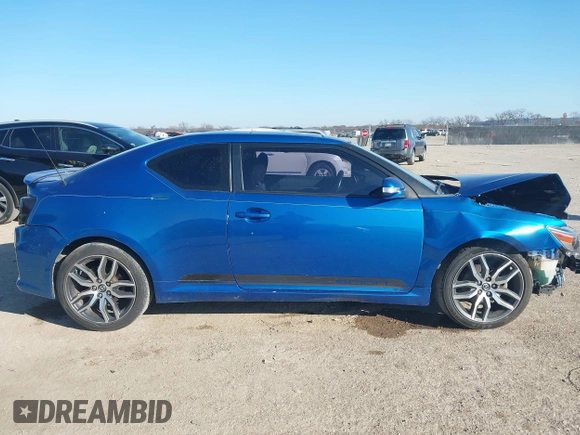 2014 Scion tC with VIN JTKJF5C78E3079618, listed as a IAAI auction lot 41107330 with 112,105 mi miles. Bid and sale history available at carsss.com. Image 14.