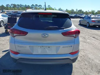 2016 Hyundai Tucson Sport with VIN KM8J33A25GU224084, listed as a IAAI auction lot 41827851 with 153,348 mi miles. Bid and sale history available at carsss.com. Image 16.