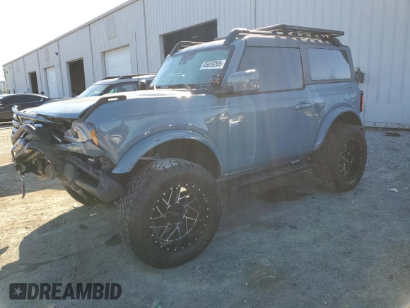 2021 Ford Bronco with VIN 1FMDE5CPXMLA63292, listed as a Copart auction lot 45659265 with 13,958 mi miles and Salvage title. Bid and sale history available at DreamBid. Image 1.