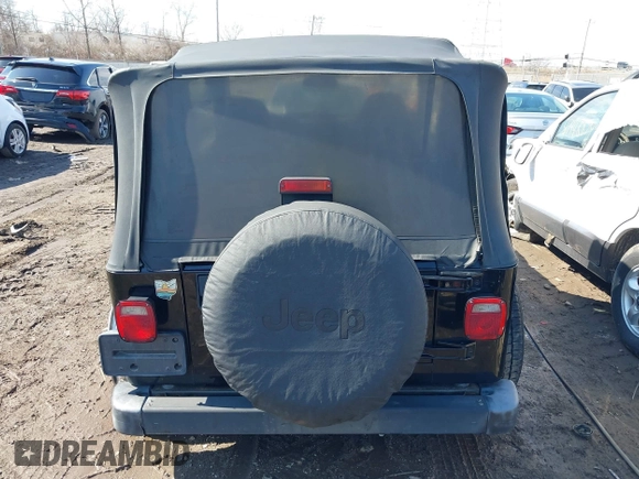 2002 Jeep Wrangler X with VIN 1J4FA39S52P770664, listed as a IAAI auction lot 41661580 with 122,445 mi miles. Bid and sale history available at carsss.com. Image 16.