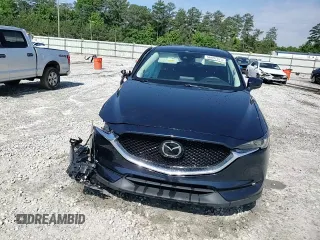 2018 Mazda CX-5 Grand Touring z VIN JM3KFADM5J1420690, wystawiony jako Copart lot #56897875 z przebiegiem 46 483 mil mil oraz Szkoda całkowita • Salvage title. Historia ofert i sprzedaży dostępna na DreamBid. Obrazek 13.