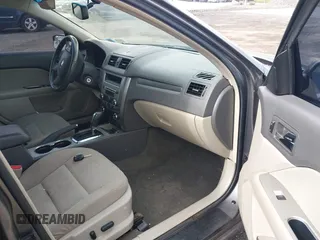 2012 Ford Fusion Hybrid с VIN 3FADP0L36CR164561, выставлен на аукционе IAAI как лот 42126136 с пробегом 172 387 миль миль и . История ставок и продаж доступна на DreamBid. Изображение 5.