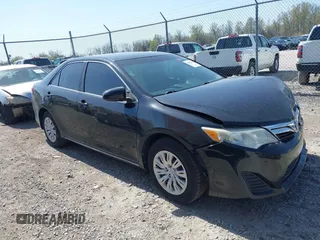 2012 Toyota Camry L with VIN 4T4BF1FK8CR271568, listed as a IAAI auction lot 42054303 with 200,186 mi miles. Bid and sale history available at carsss.com. Image 1.