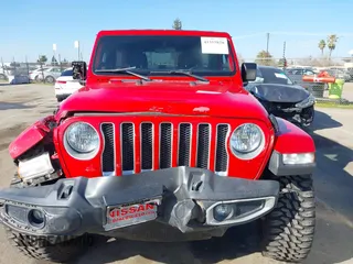2020 Jeep Wrangler Unlimited Sahara with VIN 1C4HJXEN2LW195663, listed as a IAAI auction lot 41355828 with 81,742 mi miles. Bid and sale history available at carsss.com. Image 12.