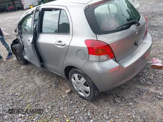 2010 Toyota Yaris with VIN JTDKT4K37A5281975, listed as a IAAI auction lot 39843782 with 257,802 mi miles. Bid and sale history available at carsss.com. Image 3.