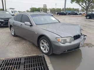 2003 BMW 7 Series 745i with VIN WBAGL63473DP64462, listed as a IAAI auction lot 41751691 with 146,789 mi miles. Bid and sale history available at carsss.com. Image 1.