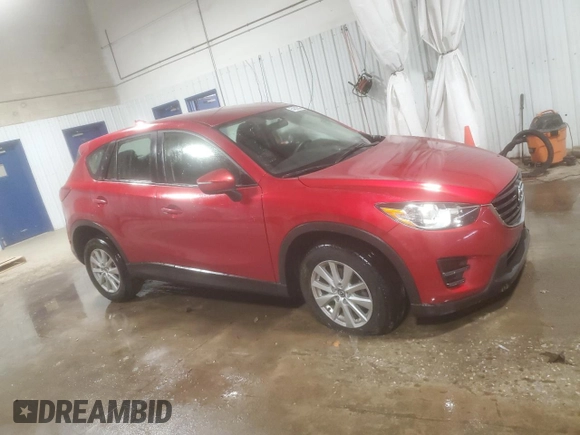 2016 Mazda CX-5 Sport with VIN JM3KE4BY4G0844967, listed as a Copart auction lot 54829885 with 95,653 mi miles and Salvage title. Bid and sale history available at DreamBid. Image 4.