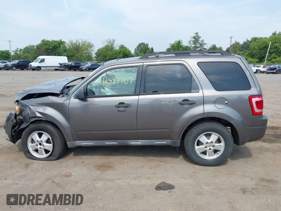 2012 Ford Escape XLT with VIN 1FMCU9DG6CKA99439, listed as a IAAI auction lot 42497707 with 186,306 mi miles and . Bid and sale history available at DreamBid. Image 14.