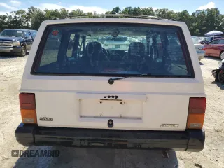 1996 Jeep Cherokee Sport with VIN 1J4FT68S4TL131956, listed as a Copart auction lot 74568064 with 174,014 mi miles and Non Repairable. Bid and sale history available at carsss.com. Image 6.