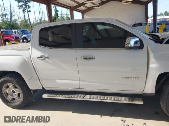 2015 GMC Canyon 2WD SLE with VIN 1GTG5CEA1F1273955, listed as a IAAI auction lot 42392908 with 79,981 mi miles and . Bid and sale history available at DreamBid. Image 13.