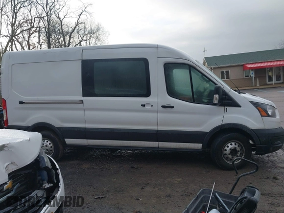 2021 Ford Transit Cargo with VIN 1FTBR2C82MKA29523, listed as a IAAI auction lot 41069336 with 195,397 mi miles and . Bid and sale history available at DreamBid. Image 13.
