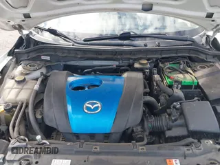 2012 Mazda Mazda3 i Touring with VIN JM1BL1L82C1695636, listed as a IAAI auction lot 41812909 with 199,314 mi miles. Bid and sale history available at carsss.com. Image 10.