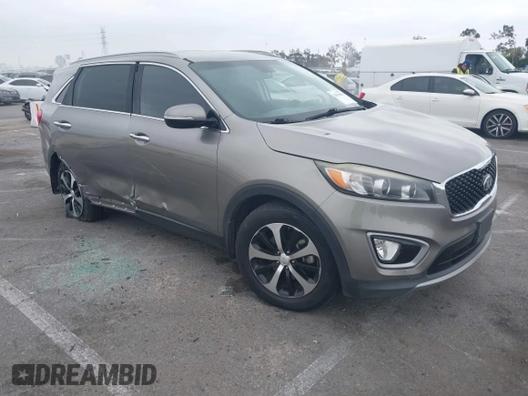 2017 Kia Sorento EX with VIN 5XYPH4A57HG228768, listed as a IAAI auction lot 42170840 with 125,420 mi miles and . Bid and sale history available at carsss.com. Image 1.
