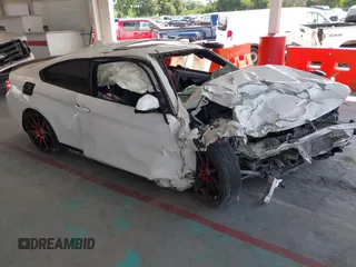 2014 BMW 4 Series 428i z VIN WBA3N3C51EK230100, wystawiony jako IAAI lot #42719031 z przebiegiem Nie podano mil oraz . Historia ofert i sprzedaży dostępna na DreamBid. Obrazek 1.