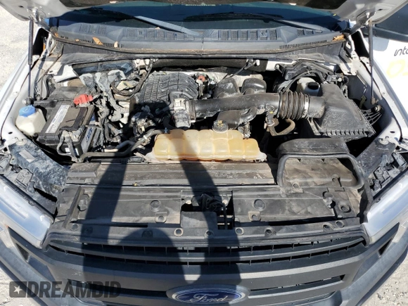 2018 Ford F-150 XL with VIN 1FTMF1EB7JFD61174, listed as a Copart auction lot 62522405 with 141,624 mi miles and Clean title. Bid and sale history available at DreamBid. Image 11.
