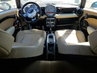2010 MINI Convertible S z VIN WMWMS3C52ATZ84995, wystawiony jako Copart lot #63445985 z przebiegiem 51 266 mil mil oraz Szkoda całkowita • Salvage title. Historia ofert i sprzedaży dostępna na DreamBid. Obrazek 8.