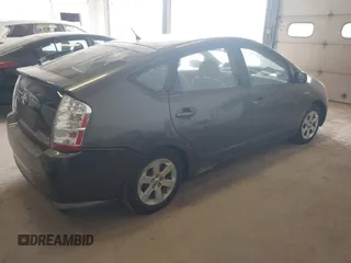 2007 Toyota Prius z VIN JTDKB20UX73266247, wystawiony jako IAAI lot #42149655 z przebiegiem 190 979 mil mil oraz . Historia ofert i sprzedaży dostępna na DreamBid. Obrazek 4.