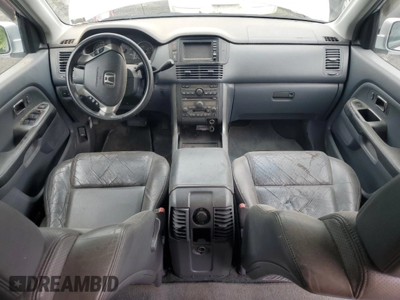 2003 Honda Pilot EX z VIN 2HKYF18763H581343, wystawiony jako Copart lot #60804525 z przebiegiem 236 636 mil mil oraz Szkoda całkowita • Salvage title. Historia ofert i sprzedaży dostępna na DreamBid. Obrazek 8.
