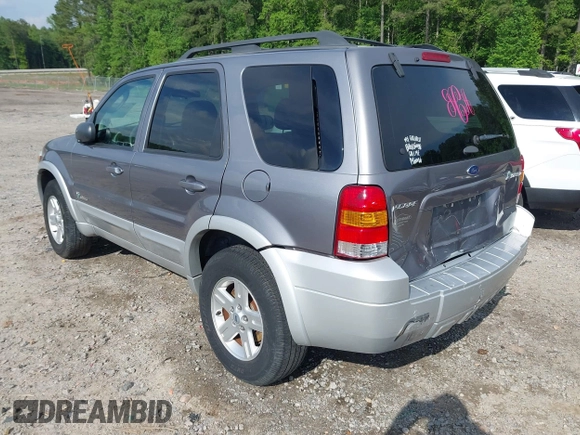 2007 Ford Escape Hybrid with VIN 1FMCU49H47KA90605, listed as a IAAI auction lot 42093591 with 136,924 mi miles and . Bid and sale history available at DreamBid. Image 3.