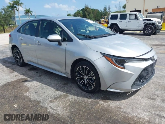 2020 Toyota Corolla LE with VIN JTDEPRAEXLJ023560, listed as a IAAI auction lot 41985501 with 59,529 mi miles. Bid and sale history available at carsss.com. Image 1.