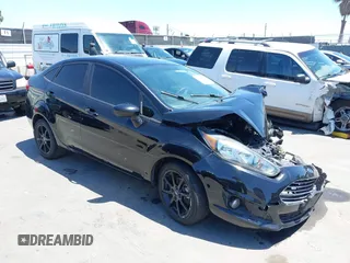 2019 Ford Fiesta SE z VIN 3FADP4BJ0KM150609, wystawiony jako IAAI lot #42372822 z przebiegiem 85 215 mil mil oraz . Historia ofert i sprzedaży dostępna na DreamBid. Obrazek 1.