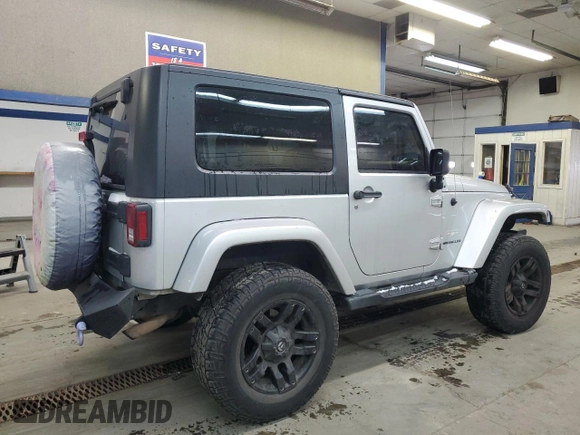 2010 Jeep Wrangler Sahara z VIN 1J4GA5D17AL109979, wystawiony jako Copart lot #45081225 z przebiegiem 190 826 mil mil oraz Szkoda całkowita • Salvage title. Historia ofert i sprzedaży dostępna na DreamBid. Obrazek 3.
