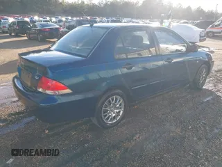 2006 Mitsubishi Lancer ES with VIN JA3AJ26E96U021297, listed as a IAAI auction lot 41462034 with 221,375 mi miles. Bid and sale history available at carsss.com. Image 4.