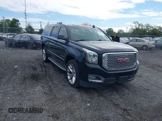2017 GMC Yukon XL Denali with VIN 1GKS2HKJ4HR384139, listed as a IAAI auction lot 40239513 with 103,603 mi miles. Bid and sale history available at carsss.com. Image 1.