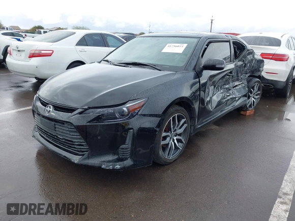 2015 Scion tC with VIN JTKJF5C79FJ003404, listed as a IAAI auction lot 41756024 with 128,906 mi miles. Bid and sale history available at carsss.com. Image 17.