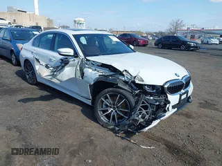 2020 BMW 3 Series 330i xDrive with VIN 3MW5R7J08L8B09946, listed as a IAAI auction lot 41989250 with 33,921 mi miles and . Bid and sale history available at DreamBid. Image 1.