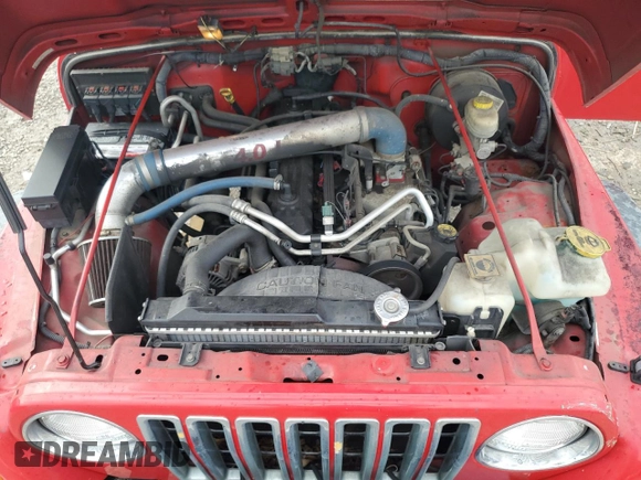 2005 Jeep Wrangler X z VIN 1J4FA39S15P337816, wystawiony jako Copart lot #55957725 z przebiegiem 107 030 mil mil oraz Szkoda całkowita • Salvage title. Historia ofert i sprzedaży dostępna na DreamBid. Obrazek 11.