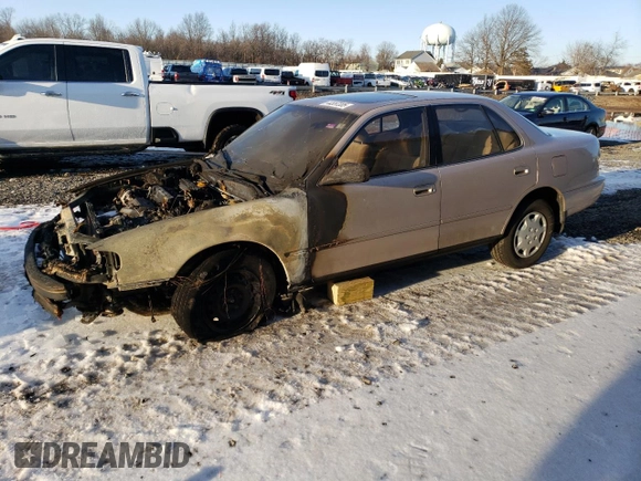 1994 Toyota Camry LE with VIN 4T1SK12E4RU448440, listed as a Copart auction lot 44557205 with 86,871 mi miles and Salvage Title. Bid and sale history available at carsss.com. Image 1.