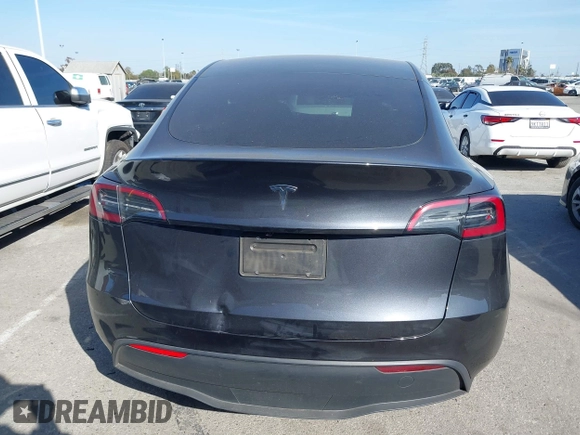 2025 Tesla Model Y Long Range with VIN 7SAYGDED2SF228414, listed as a IAAI auction lot 41706470 with 11,319 mi miles and . Bid and sale history available at DreamBid. Image 16.