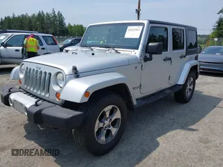 2012 Jeep Wrangler Unlimited Altitude with VIN 1C4HJWEG2CL140059, listed as a IAAI auction lot 42433563 with 189,868 mi miles and . Bid and sale history available at DreamBid. Image 2.