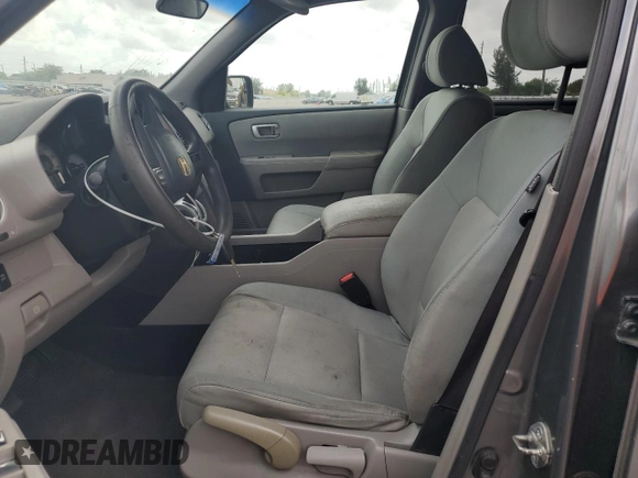2009 Honda Pilot LX with VIN 5FNYF382X9B028461, listed as a Copart auction lot 52068575 with 189,267 mi miles and Salvage title. Bid and sale history available at DreamBid. Image 7.