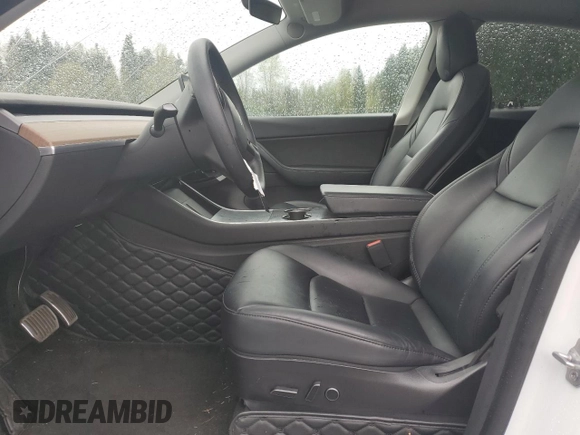 2021 Tesla Model Y Long Range with VIN 5YJYGAEE2MF115988, listed as a Copart auction lot 52206535 with 53,911 mi miles and Salvage Title. Bid and sale history available at DreamBid. Image 7.