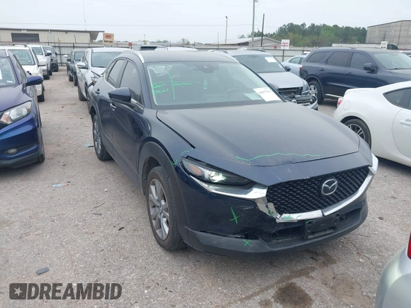 2023 Mazda CX-30 S Carbon Edition with VIN 3MVDMBCM1PM520066, listed as a IAAI auction lot 41877916 with 22,973 mi miles and . Bid and sale history available at carsss.com. Image 1.