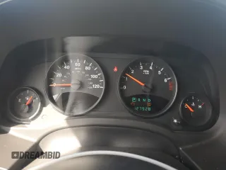 2011 Jeep Patriot Sport with VIN 1J4NF1GBXBD279089, listed as a Copart auction lot 53934335 with 127,928 mi miles and Salvage Title. Bid and sale history available at carsss.com. Image 9.