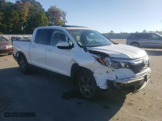 2020 Honda Ridgeline RTL-E with VIN 5FPYK3F77LB002473, listed as a Copart auction lot 77117414 with 62,631 mi miles and Salvage Title. Bid and sale history available at carsss.com. Image 4.