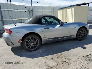 2017 FIAT 124 Spider Lusso z VIN JC1NFAEKXH0114164, wystawiony jako Copart lot #62959405 z przebiegiem 11 879 mil mil oraz Szkoda całkowita • Salvage title. Historia ofert i sprzedaży dostępna na DreamBid. Obrazek 3.