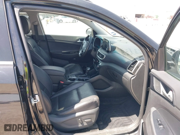 2021 Hyundai Tucson Ultimate with VIN KM8J33ALXMU289579, listed as a IAAI auction lot 42027719 with 95,989 mi miles and . Bid and sale history available at DreamBid. Image 5.