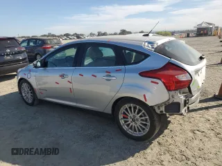 2014 Ford Focus Electric with VIN 1FADP3R45EL287285, listed as a Copart auction lot 74148154 with 64,543 mi miles and Salvage title. Bid and sale history available at DreamBid. Image 2.