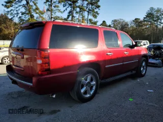 2013 Chevrolet Suburban LTZ with VIN 1GNSCKE09DR355763, listed as a Copart auction lot 87019024 with 135,748 mi miles and Salvage Title. Bid and sale history available at carsss.com. Image 3.