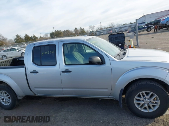 2014 Nissan Frontier SL z VIN 1N6AD0FV3EN767134, wystawiony jako IAAI lot #41463305 z przebiegiem 63 553 mil mil oraz . Historia ofert i sprzedaży dostępna na DreamBid. Obrazek 13.