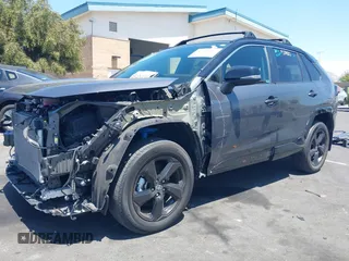 2021 Toyota RAV4 Hybrid XSE with VIN 2T3E6RFVXMW016803, listed as a IAAI auction lot 42135617 with 40,898 mi miles and . Bid and sale history available at DreamBid. Image 2.