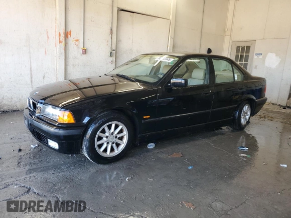 1997 BMW 3 Series 328iA with VIN WBACD432XVAV46101, listed as a Copart auction lot 88912345 with 149,163 mi miles and Salvage Title. Bid and sale history available at carsss.com. Image 1.